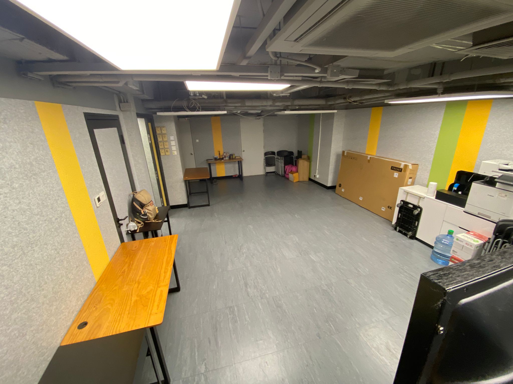 Easy Solution Training Room — side view with desks and storage